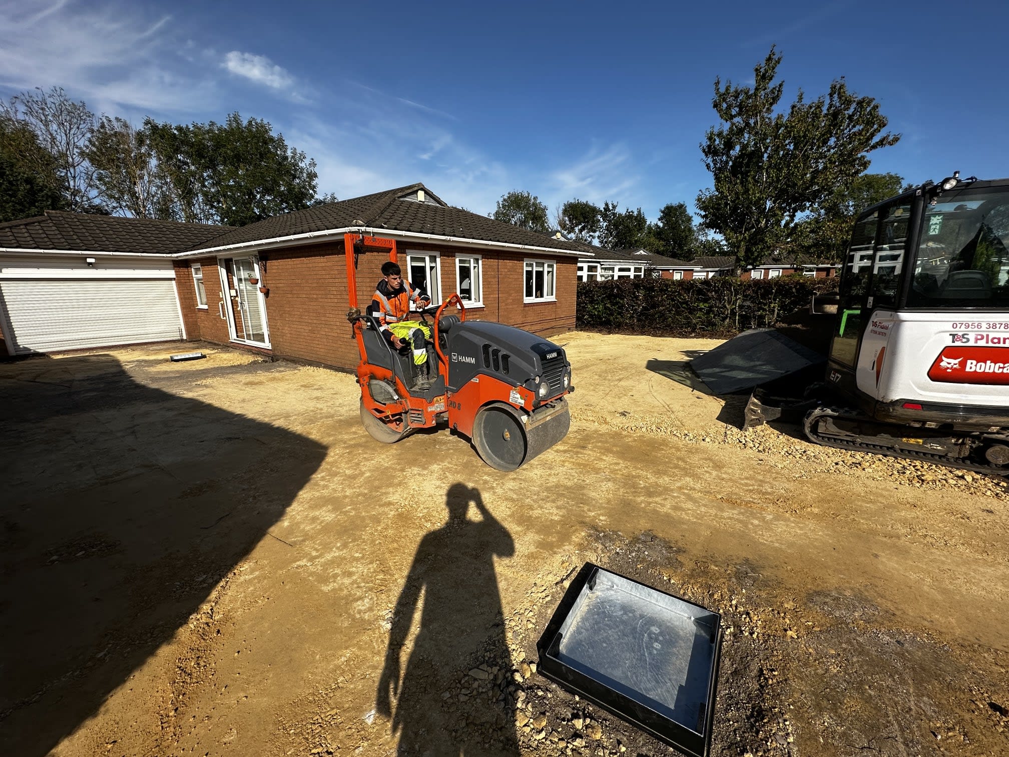 Our crew and plant machinery excavating a driveway before the sub-base goes down
