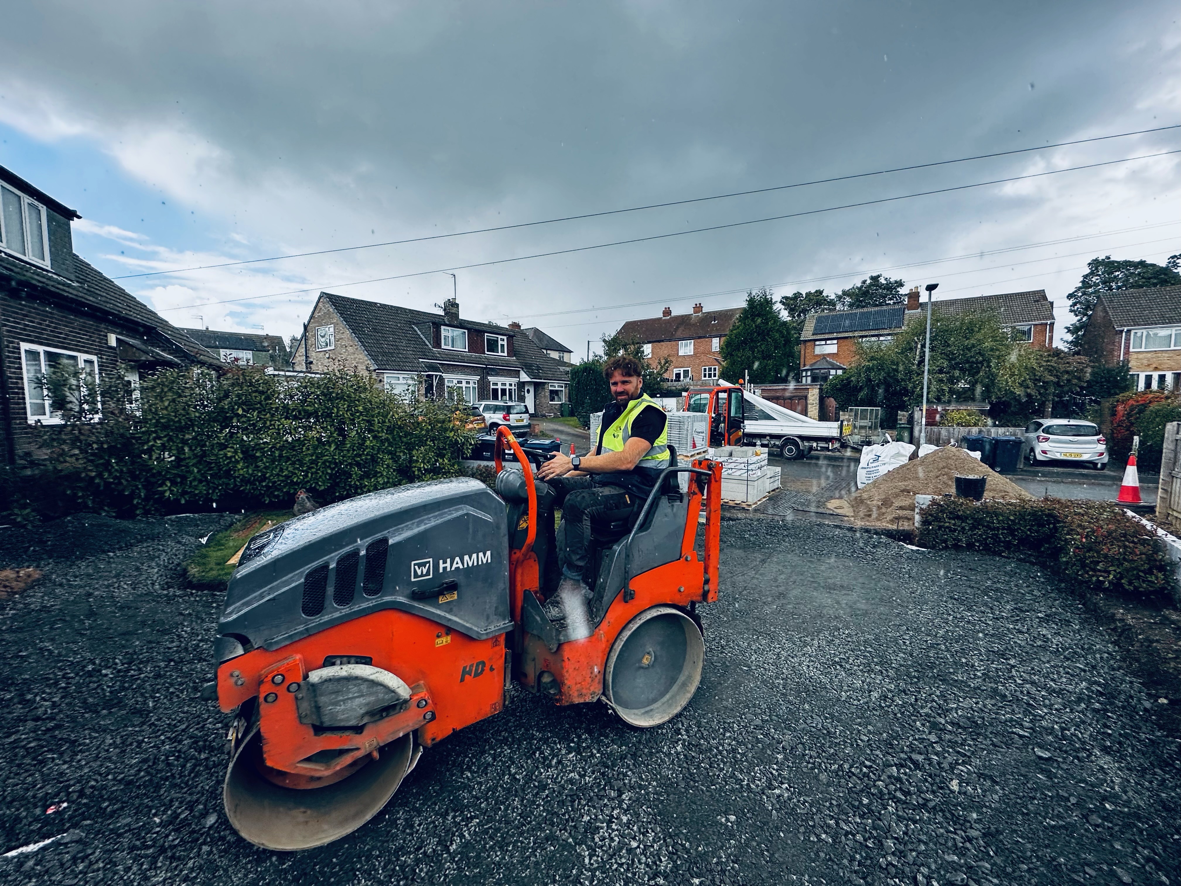 Crew and plant machinery working on site