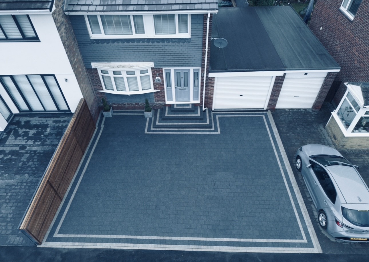 Block paving driveway with contrasting border course