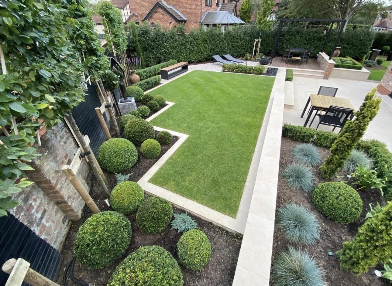 Two tone block paved driveway and lawn